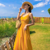2025 New Hainan Sanya Yellow Beach Dress Women's Summer Sexy Seaside Vacation Slings Bare Back Dress