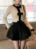 Autumn A Set Of Evening Star Slats Small Fragrant Feel Vertical Black And White Bow Bump Color Waist Knitted Shirt