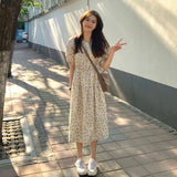 Summer 2026 New Seaside Holiday Temperament Floral Dress Orange Tea Break French Dress Girl Loose