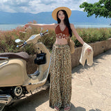 2025 Yunnan Northwest Tourism Knitted Twisted Espoo Hollow Coat + Irregular Flower Type High-Waist Broad Leg Pants