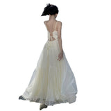2025 French Heavy Industry Dress Swizzling Pure-Color Butterfly Sling Dress Two-Color Female Sanya Holiday Dress