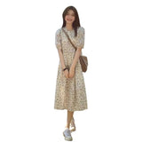 Summer 2026 New Seaside Holiday Temperament Floral Dress Orange Tea Break French Dress Girl Loose