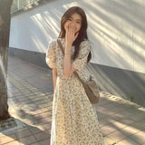 Summer 2026 New Seaside Holiday Temperament Floral Dress Orange Tea Break French Dress Girl Loose