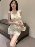Pure Lust Wind Holiday Wind Hanging Neck Deep Dress Female Summer De Shredded Flower Babes Bag Ass Short Dress Dopamine Skirt