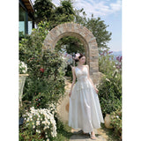 2025 High-End Design White Temperament Early Spring French Holiday Hanging Neck Hollow Embroidery Tying Dress